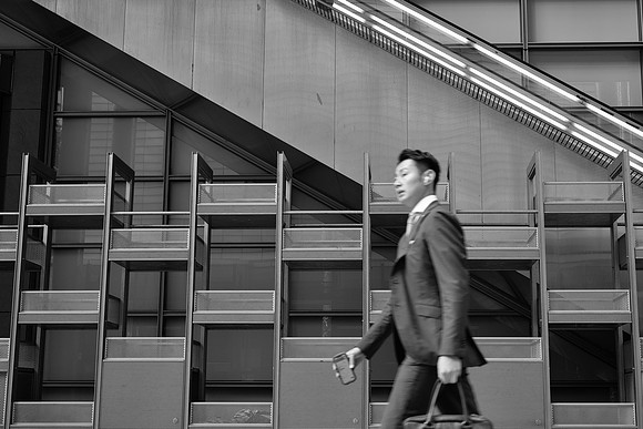 Tokyo man rushing BW