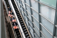Tokyo pink bags on escalator