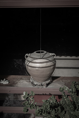 FLW pot / hole in window