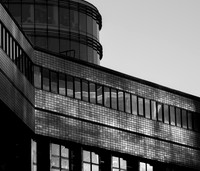 180119 building reflecting sun bw