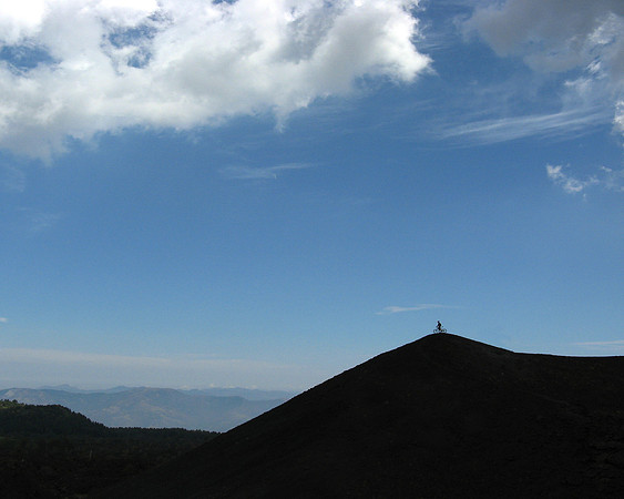 hill top bike silhouette landscape