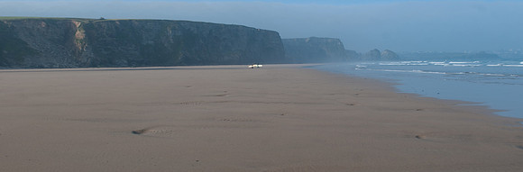 Watergate Bay lone surfers