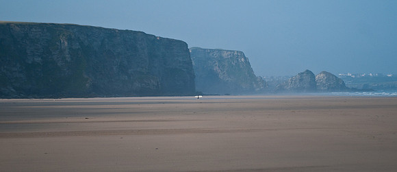 Watergate Bay, Cornwall- lone surfer