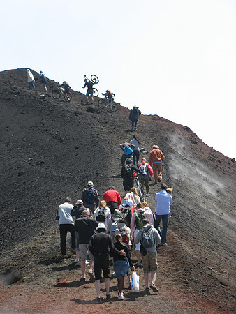 Etna summit tourists and bikes