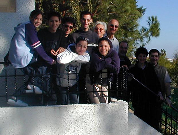 family on balcony dec01 reduced size