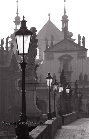 Gary Colet prague charles bridge streetlights bw