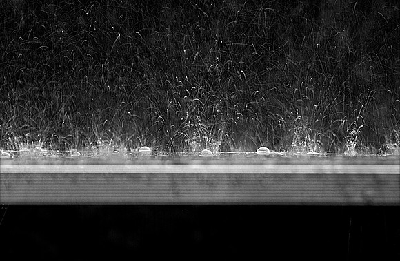 rain on table tennis bw