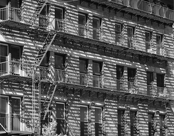Fire escape shadows. Flatbush Ave., Brooklyn, New York