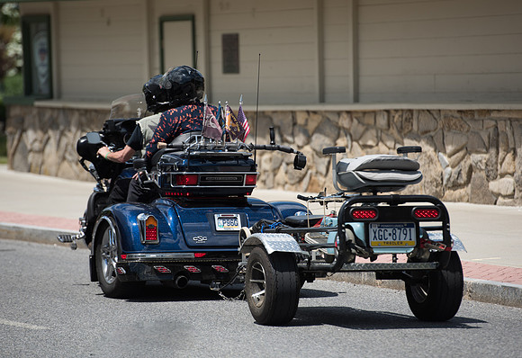 Trike towning mobility scooter at Harley Davidson rally, Lake George, New York State