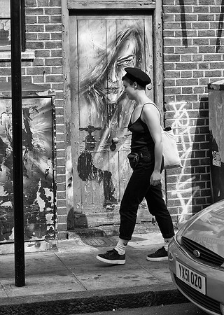 Fortune Street, girl in beret and graffiti door