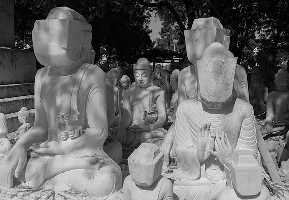 Mandalay Buddahs queuing faceless bw