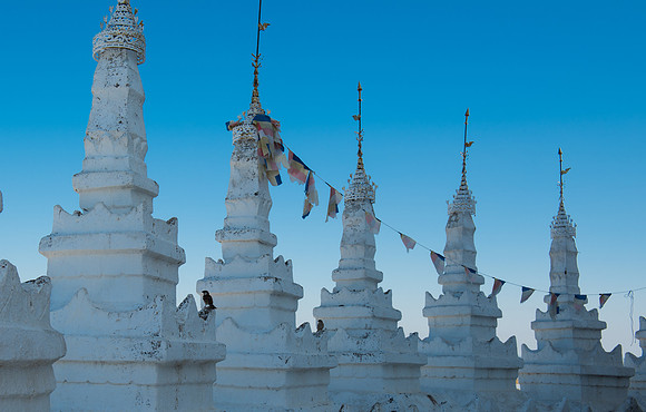 Mandalay Mingun white temple flags