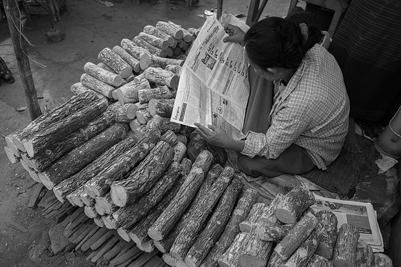 Market Thanaka (face wode) bark seller bw