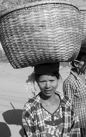 Market woman with basket bw