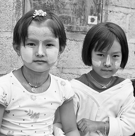 Village children 2 girls with thanaka bw