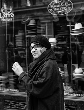 Hatters lady on mobile bw