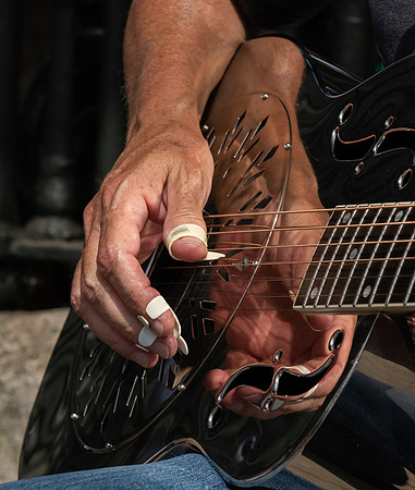 Greenwich busker slide guitar hands portrait