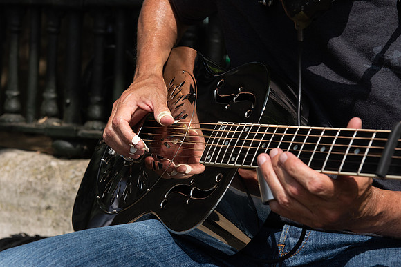 Greenwich busker slide guitar hands