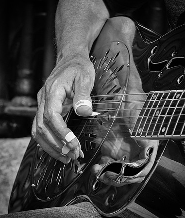 Greenwich busker slide guitar hands portrait BW