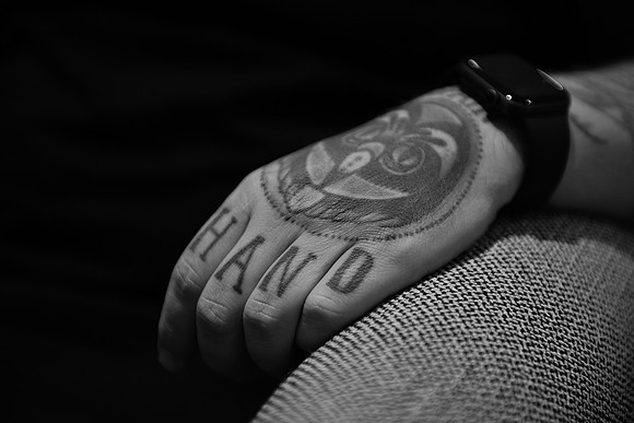 JFK hand tattoo bw