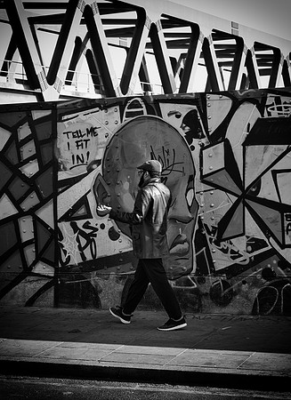 Brick Lane walker bw