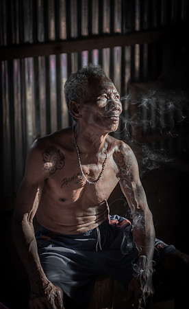 Mengkak Iban man smoking
