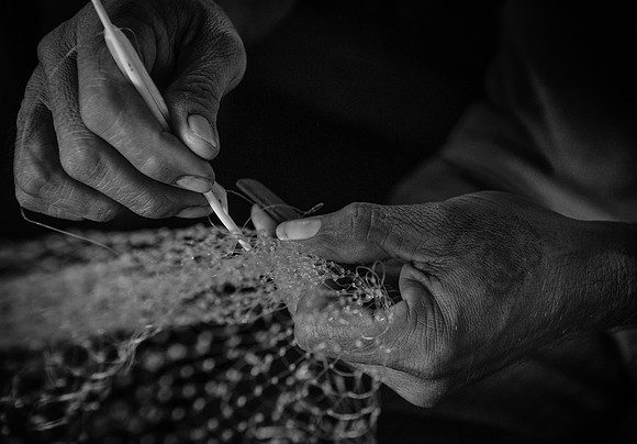 Mengkak longhouse fishnet repair bw