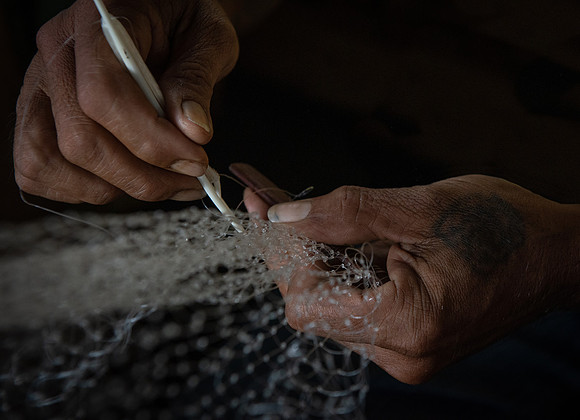 Mengkak longhouse fishnet repair