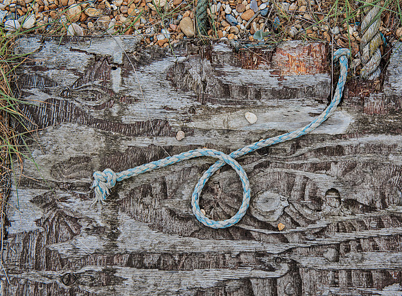 Distressed wood and rope