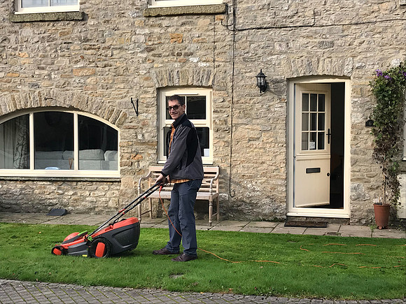 Gary mowing grass Easby