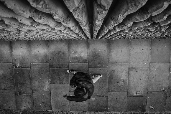 Minories wall walk man bw