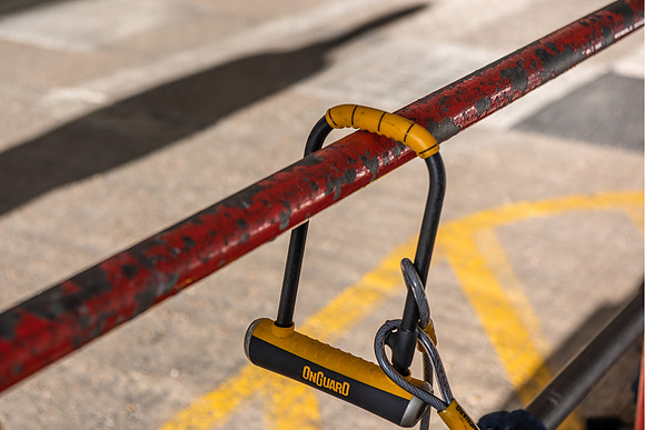 Minories red railing yellow lock