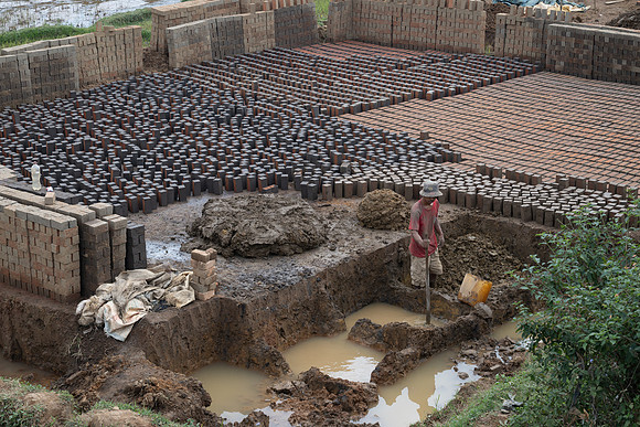 Making bricks from rice paddy mud