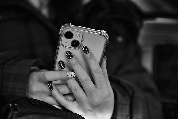 Tube Hands on phone polka dot nails BW